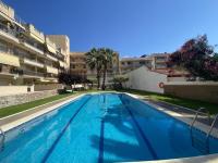 R123 Apartamento con parking + piscina - B&B Calafell