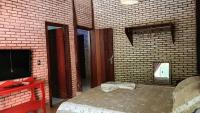 Chambre Double ou Lits Jumeaux Deluxe – Vue sur Jardin