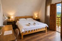 Kamer met Queensize Bed en Balkon