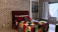 Chambre Double ou Lits Jumeaux Deluxe – Vue sur Jardin