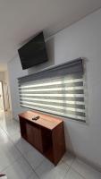 Chambre Quadruple avec Salle de Bains Privative