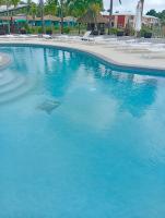 Appartement MANBANA 320 - accès direct a la plage - Bed and Breakfast Grand-Bourg