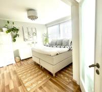 Premium three-room apartment with own parking and balcony - next to the subway in Lauttasaari! - Chambres d'hôtes Helsinki