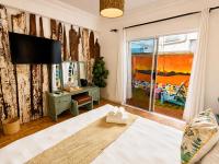 Kamer met Kingsize Bed en Uitzicht op de Tuin