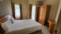 Jet Villa - Amandier 2-Bedroom Apartment with Pool near Flic en Flac Beach - B&B Flic en Flac