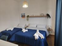 Chambre Triple avec Salle de Bains Privative