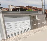 Casa confortável e aconchegante com piscina e churrasqueira com utensílios e roupas de cama - Ferienwohnung Peruíbe