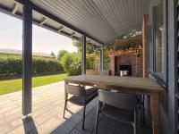 Landstudio - Schwedenhaus mit Kamin am Feldrand - Bed and Breakfast Tensbüttel-Röst