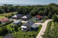 Haus KüstenBrise - Urlaub mit Hund an der Küste mit eigenen Garten, Sauna und gemütlichen Kaminfeuer - Chambres d'hôtes Schweiburg