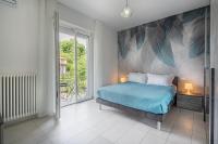 Blue Garden Como - 2BR - Free Parking - Chambres d'hôtes Côme
