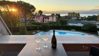 Lake view Garda apartment - Swimming pool - Chambres d'hôtes Desenzano del Garda