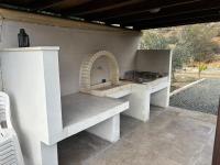 Sofros To Apomero - Chambres d'hôtes Ágios Pávlos