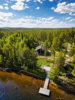 Norvamaja with a lake view, sauna and jacuzzi - B&B Rovaniemi