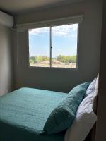 Apartamento aconchegante, a 500m do Shopping e próximo à Praia da Graciosa - Bed and Breakfast Palmas