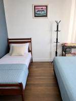 Apto completo em São Vicente ideal para família e trabalho 2 quadras da praia - Chambres d'hôtes São Vicente