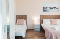 Deluxe tweepersoonskamer met balkon en uitzicht op zee