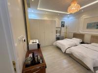 غرفة نوم 3 أسرّة مدخل خاص بدون صالة - B&B Al Bahah