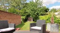 Oasis Citadine Terrasse intime jardin privatif en plein centre ville 70m2 - Chambres d'hôtes Cambrai