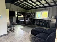 Private jungle retreat with AC and WiFi near Volcano - Chambres d'hôtes Kurtistown