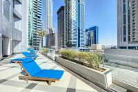 Vacationer Holiday Homes I Glamorous 2 Bedroom I Steps from Barasti Beach I Marina Views - Chambres d'hôtes Dubaï