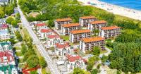 Apartament z parkingiem i tarasem przy Promenadzie, Apartment mit privatem Parkplatz und Terrasse an der Promenade - Apartamenty na Wyspie - Chambres d'hôtes Świnoujście