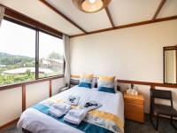 Tweepersoonskamer met Gedeelde Badkamer