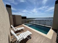 Moderno departamento con piscina con vista al río - Bed and Breakfast Encarnación