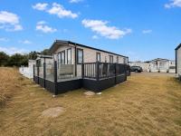 Modern 6 Berth Caravan With Decking At Suffolk Sands Ref 45004F - B&B Felixstowe
