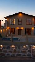 منتجع وأكواخ بيرلي - Bed and Breakfast Āl aţ Ţawīl