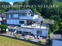 Seeblick-Ferienwohnung "Agger-Blick 1" mit großer Terrasse, kostenlosen E-Bikes, Sauna & Kajak - Chambres d'hôtes Gummersbach
