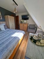 Driepersoonskamer met een Balkon en een Eigen Externe Badkamer