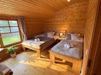 Zweibettzimmer mit Gartenblick