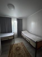 Tweepersoonskamer met 2 Aparte Bedden