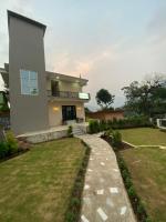 The White Flower Homestay - Bed and Breakfast Kāthgodām