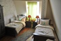 Tweepersoonskamer met 2 Aparte Bedden en een Extra Bed