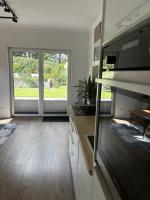 Moderne 1-Zimmer-Gästewohnung im Neubau mit schönem Garten - Ferienwohnung Pronstorf