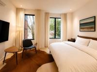 Deluxe Zimmer mit Kingsize-Bett
