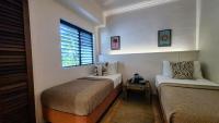 Maison Sauvage Retro Tropical Retreat - Chambres d'hôtes Port Douglas