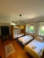Camera Quadrupla con Bagno in Comune 