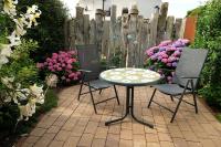 Wohlfühloase mit Terrasse im Garten & Privatparkplatz - Ferienwohnung Rostock