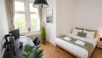 NUJU Rentals - 4-Zimmer, 10 Gäste, Wintergarten & Terrasse & Parkplatz - Chambres d'hôtes Bielefeld