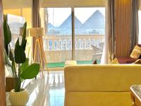Pyramids View1 Apartment - Bed and Breakfast Caïro