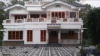 Vallooran house,Nalukettu-Palissery - Chambres d'hôtes Idayār