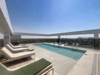 Vacationer Holiday Homes l Minimalist 2 Bedroom l near Cricket Stadium - Chambres d'hôtes Dubaï