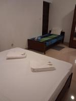Basic Dreibettzimmer mit Gemeinschaftsbad