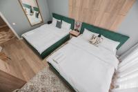 Апартаменты возле ТРЦ MEGA с 8 спальными местами - B&B Almatý