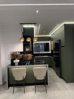 Premium City Apartment - Chambres d'hôtes Pýrgos