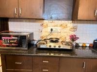 AP luxe stays 2bhk Home Theaterchillrelax - Chambres d'hôtes New Delhi