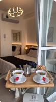 Essenza Manhattan Olive Green Luxury Studio /Centro Curitiba - B&B Curitiba