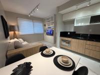 Loft moderno e completo, com piscina, academia e garagem no MaxPlaza, em Canoas - Chambres d'hôtes Canoas